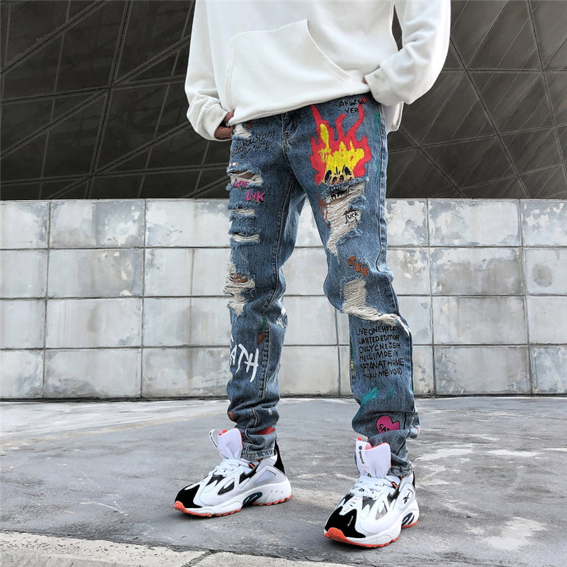 Hip Hop Streetwear Ripped Slim Fit Jeans Skinny Jeans Japan Graffiti Flame Skeleton Print Men Jogger Denim Pants